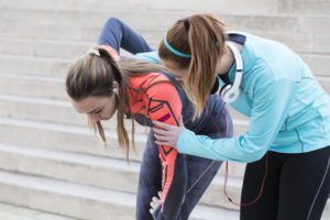 Female Athlete and Physical Therapist